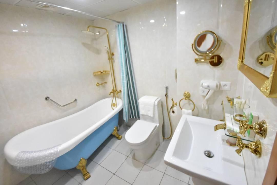 Grand Hotel Aeroport, Douala Bagian luar foto